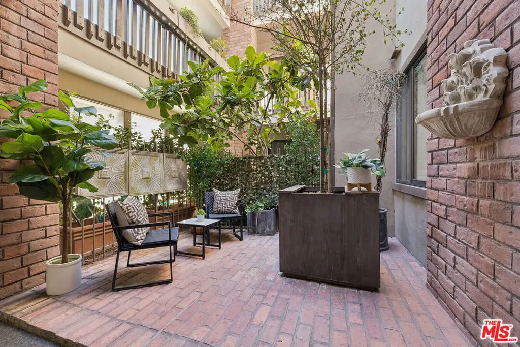 Condominium for sale at 141 S Linden Drive 104, Beverly Hills, CA featuring 2 beds and 2 baths