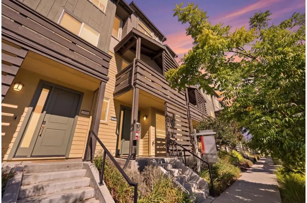 Townhouse for sale at 2058 Tarob Court, Milpitas, CA featuring 3 beds and 3 baths