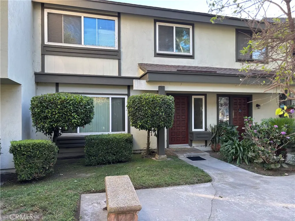 Townhouse for sale at 9753 Karmont, South Gate, CA featuring 3 beds and 3 baths