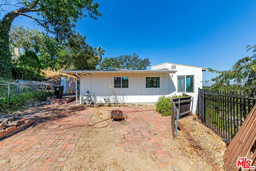 Single Family Residence for sale at 14301 Mulholland Drive, Los Angeles, CA featuring 2 beds and 2 baths