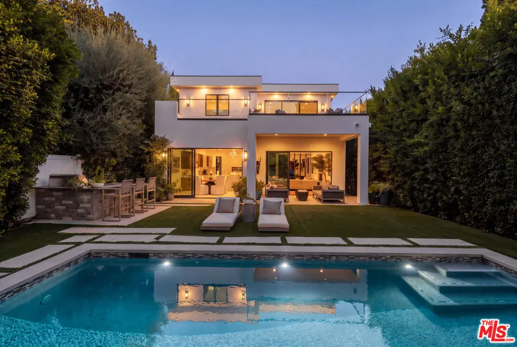 Single Family Residence for sale at 144 N Bowling Green Way, Los Angeles, CA featuring 5 beds and 8 baths