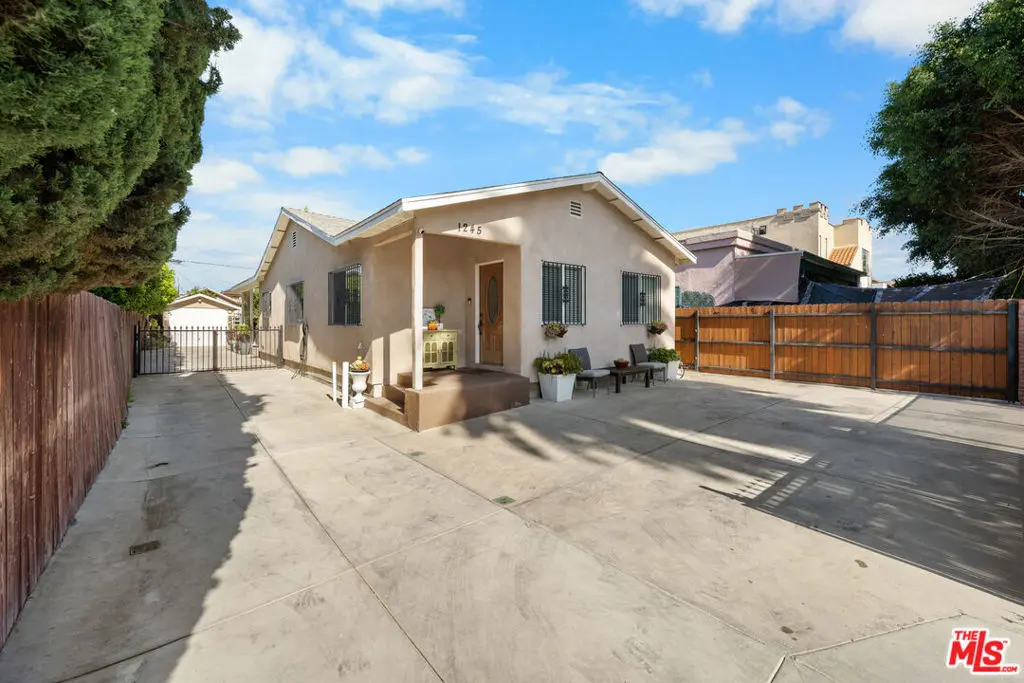 Single Family Residence for sale at 1245 S Muirfield Road, Los Angeles, CA featuring 3 beds and 2 baths