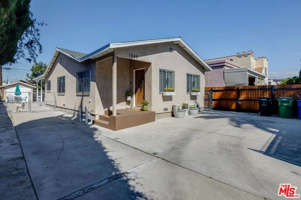 Single Family Residence for sale at 1245 S Muirfield Road, Los Angeles, CA featuring 3 beds and 2 baths