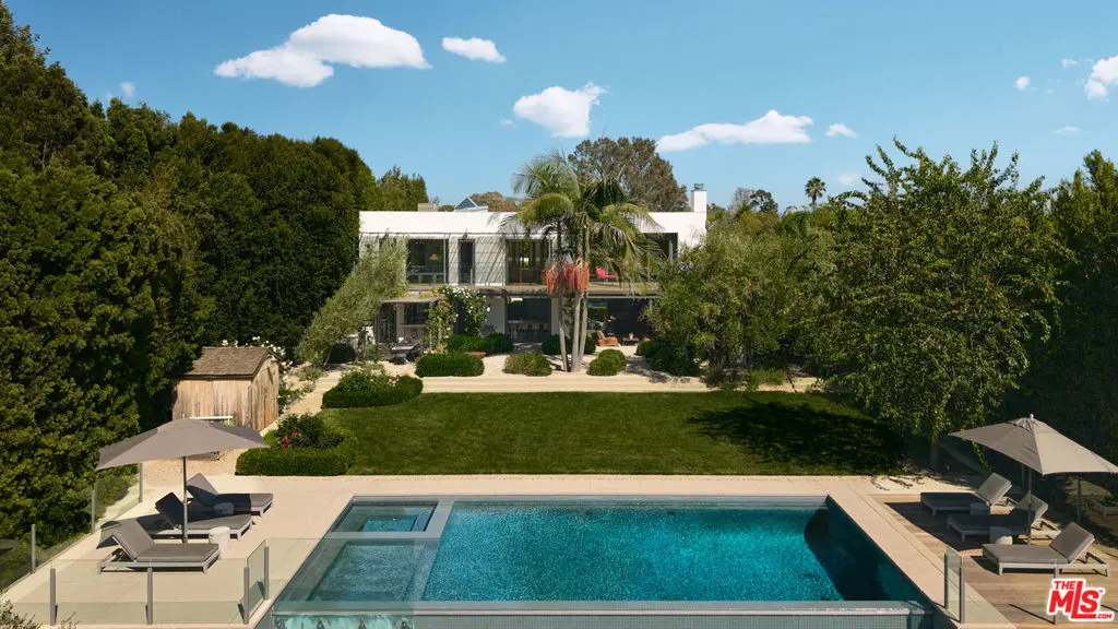 Single Family Residence for sale at 621 N Bonhill Road, Los Angeles, CA featuring 5 beds and 6 baths