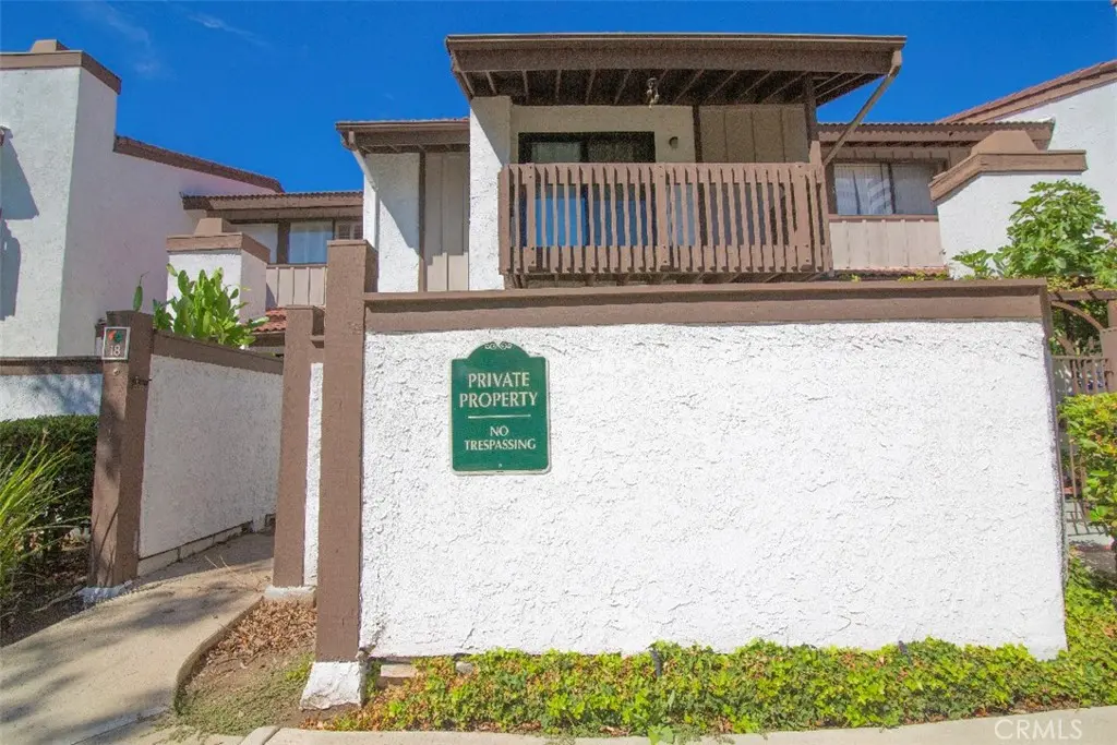 Townhouse for sale at 6255 Canoga Avenue 18, Los Angeles, CA featuring 2 beds and 2 baths