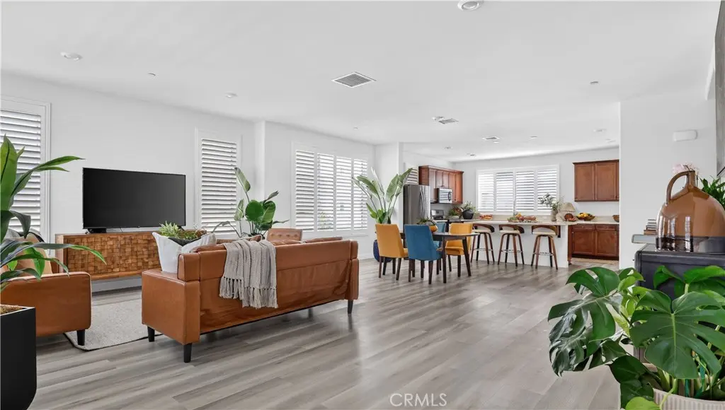 Townhouse for sale at 10670 Paramount Boulevard, Downey, CA featuring 4 beds and 4 baths