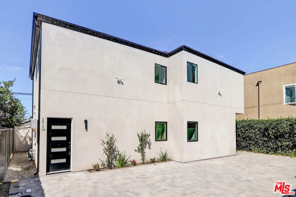 Residential for sale at 2813 1/2 12th Ave, Los Angeles, CA featuring 3 beds and 2 baths