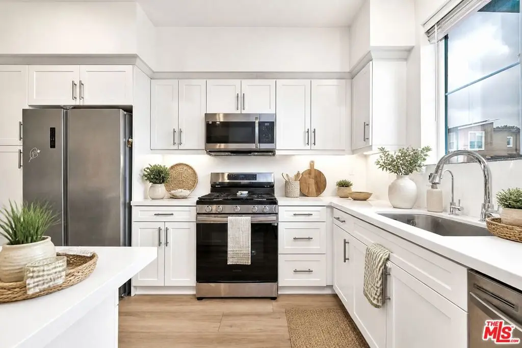 Townhouse for sale at 11737 Florence Avenue 6, Santa Fe Springs, CA featuring 3 beds and 4 baths