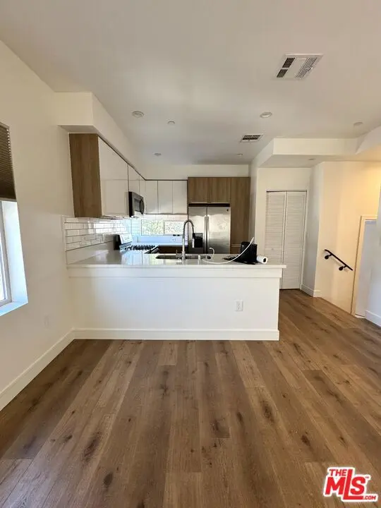 Condominium for rent at 250 S Burlington Avenue, Los Angeles, CA featuring 3 beds and 4 baths