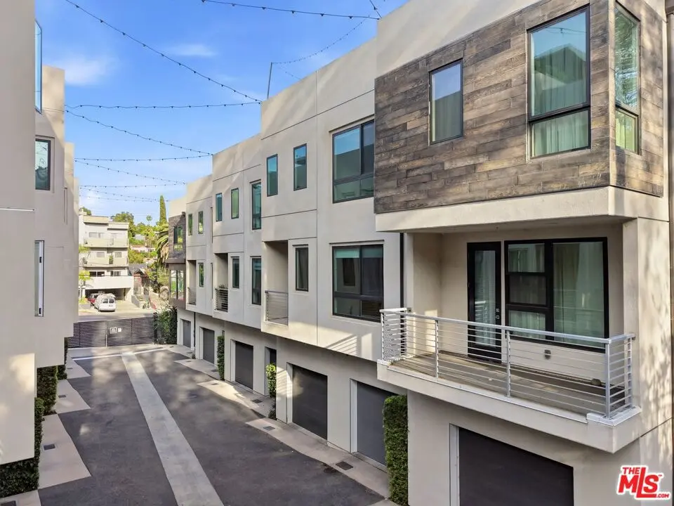Townhouse for sale at 2111 N Cahuenga Boulevard 11, Los Angeles, CA featuring 3 beds and 4 baths