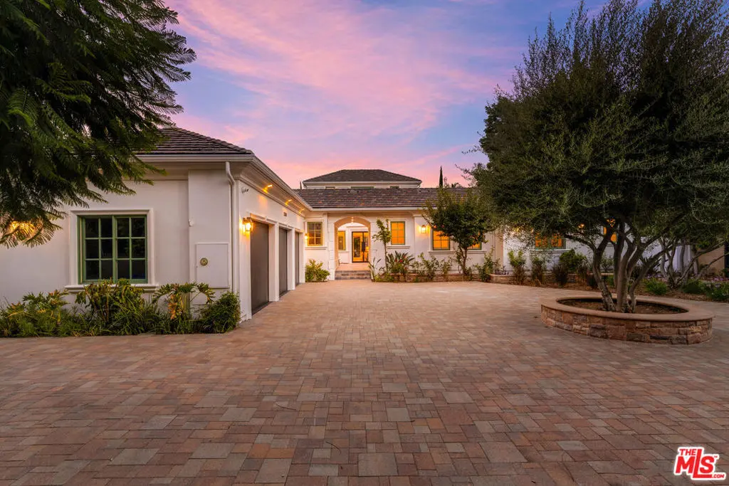 Residential for sale at 23334 Ostronic Drive, Woodland Hills, Los Angeles County, CA featuring 7 beds and 9 baths