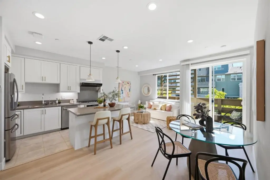 Townhouse for sale at 2058 Tarob Court, Milpitas, CA featuring 3 beds and 3 baths