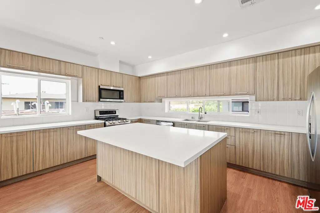 Condominium for rent at 816 N Hobart Boulevard, Los Angeles, CA featuring 4 beds and 5 baths