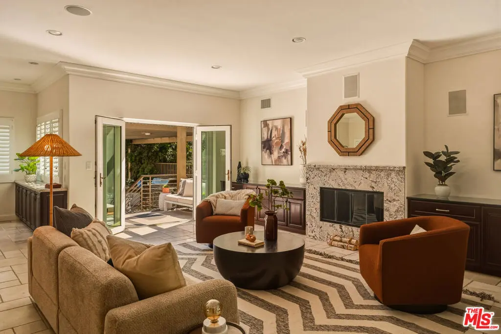 Single Family Residence for sale at 854 S Rimpau Boulevard, Los Angeles, CA featuring 5 beds and 7 baths