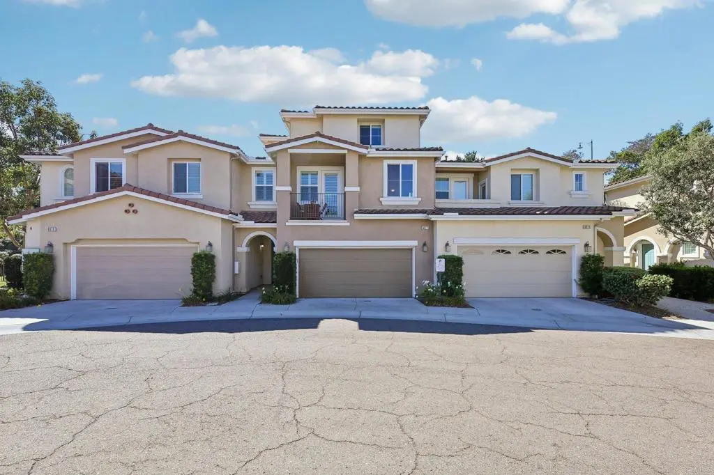 Townhouse for sale at 6977 Brass Pl, Carlsbad, CA featuring 4 beds and 4 baths