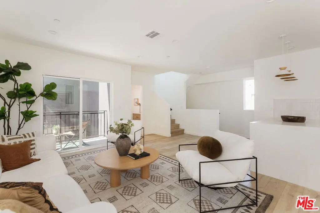 Townhouse for sale at 1231 1/2 N June Street, Los Angeles, CA featuring 4 beds and 5 baths