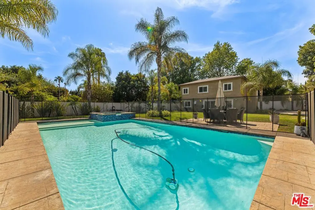 Single Family Residence for rent at 8817 Encino Avenue, Los Angeles, CA featuring 8 beds and 6 baths
