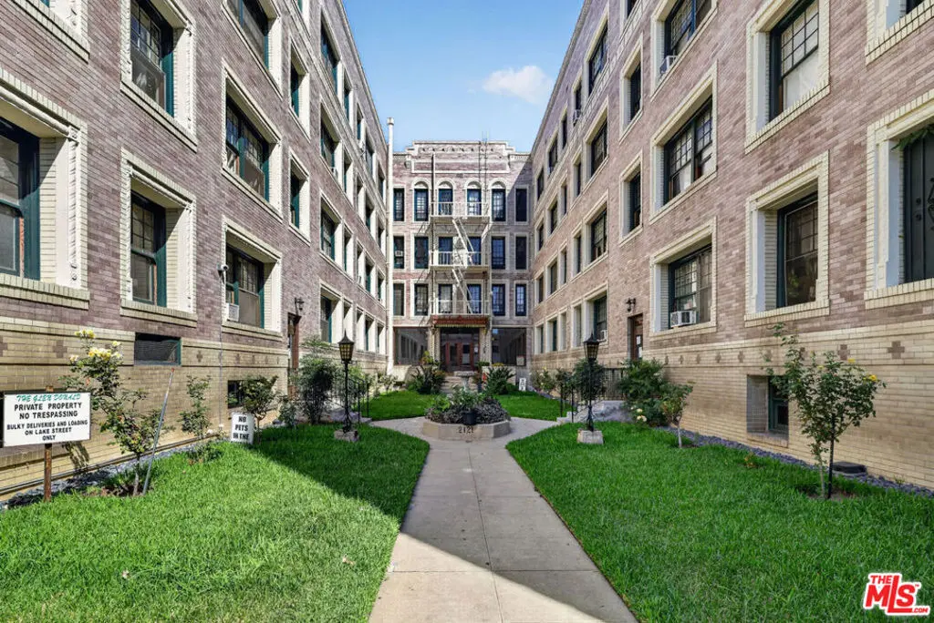 Condominium for sale at 2121 James M Wood Boulevard 202, Los Angeles, CA featuring 1 bed and 1 bath