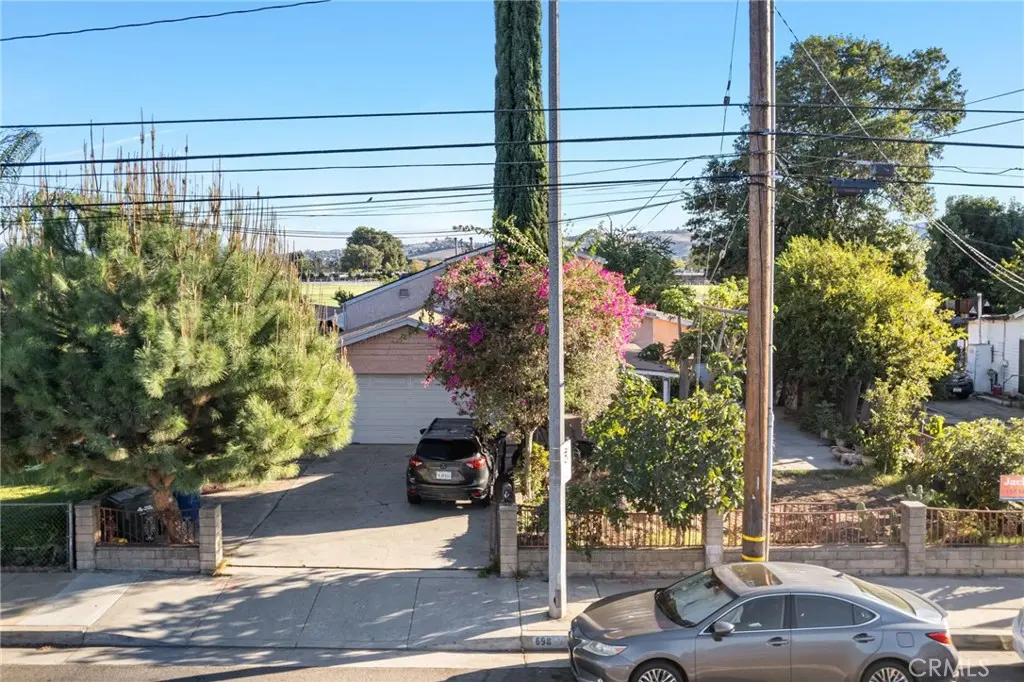 Single Family Residence for sale at 698 W Phillips, Pomona, CA featuring 5 beds and 4 baths