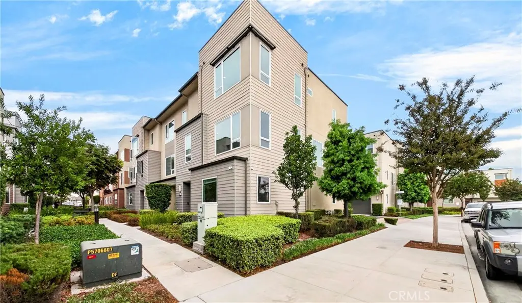 Townhouse for sale at 8028 Cypress Lane, Downey, CA featuring 4 beds and 4 baths
