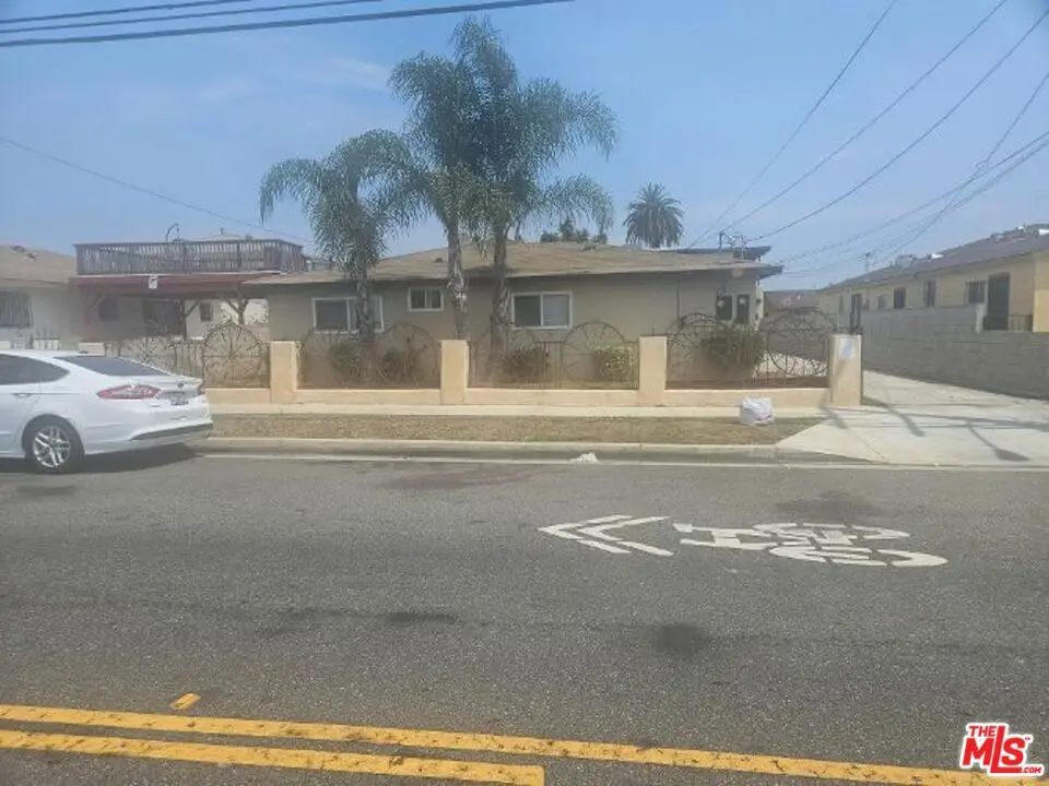 Residential Income for sale at 1461 W 108th Street, Los Angeles, CA featuring 7 beds and 4 baths
