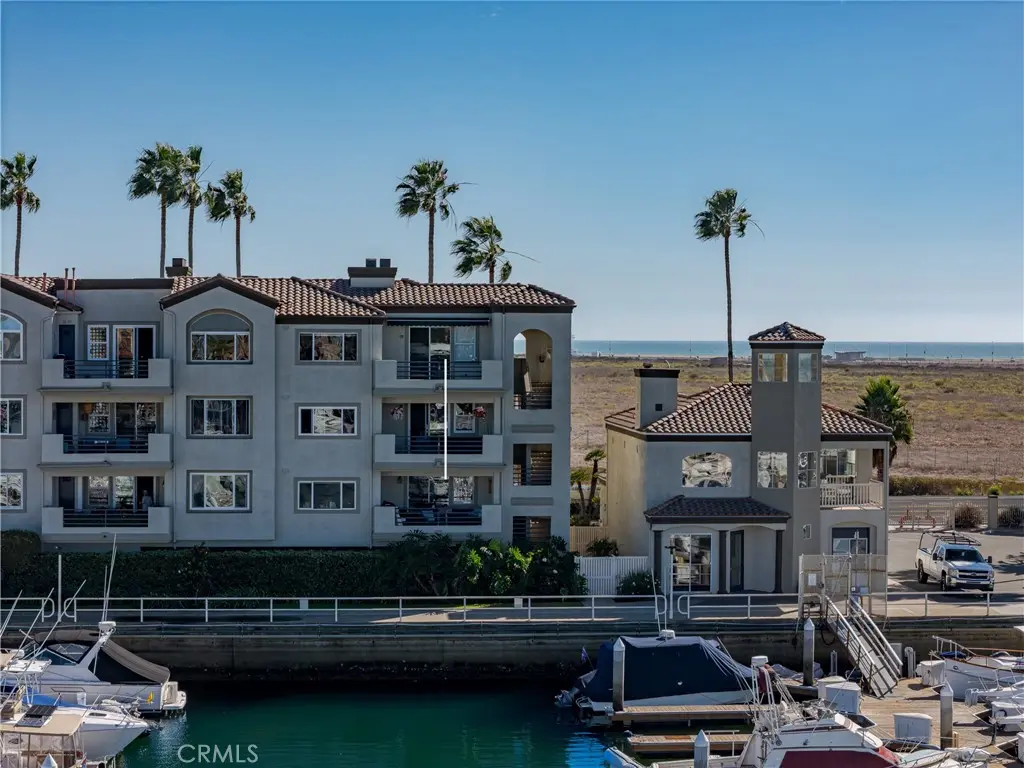 Condominium for sale at 4165 Warner #101, Huntington Beach, CA featuring 2 beds and 2 baths