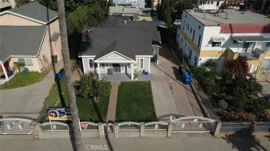 Single Family Residence for sale at 210 N Berendo Street, Los Angeles, CA featuring 3 beds and 2 baths
