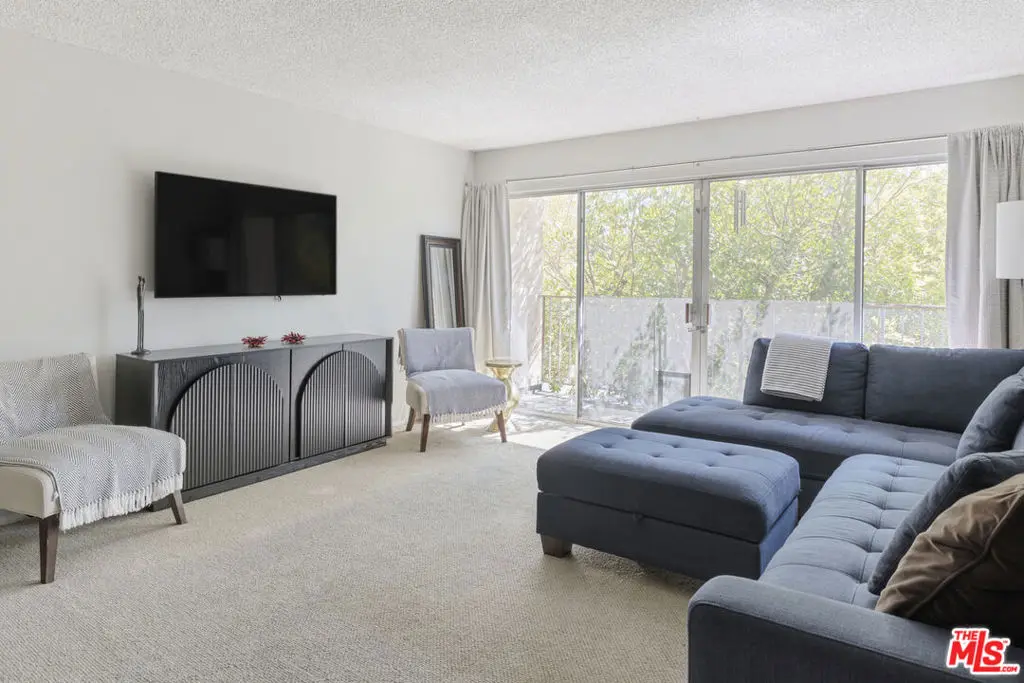 Condominium for sale at 6771 Springpark Avenue 102A, Los Angeles, CA featuring 2 beds and 2 baths