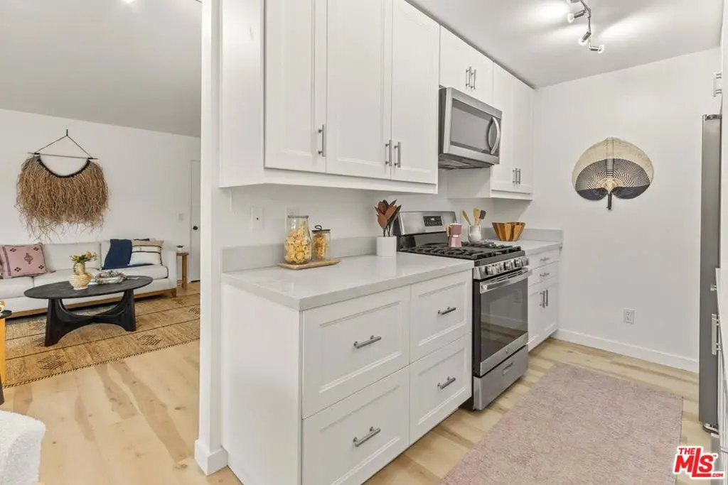 Condominium for sale at 3325 Bagley Avenue 105, Los Angeles, CA featuring 2 beds and 2 baths