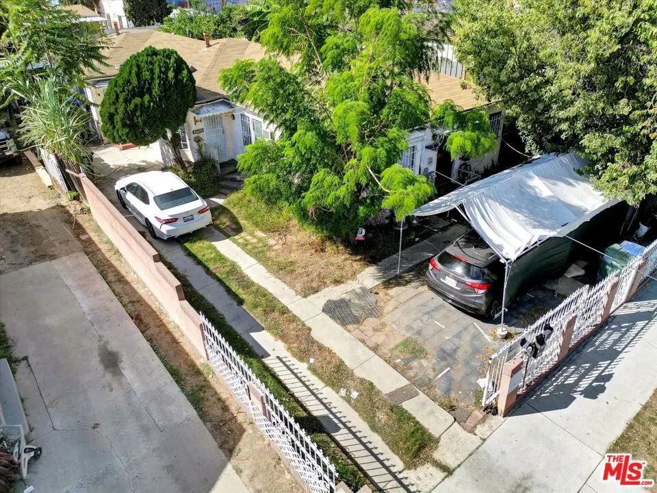 Residential Income for sale at 8611 Elm Street, Los Angeles, CA featuring 4 beds and 3 baths
