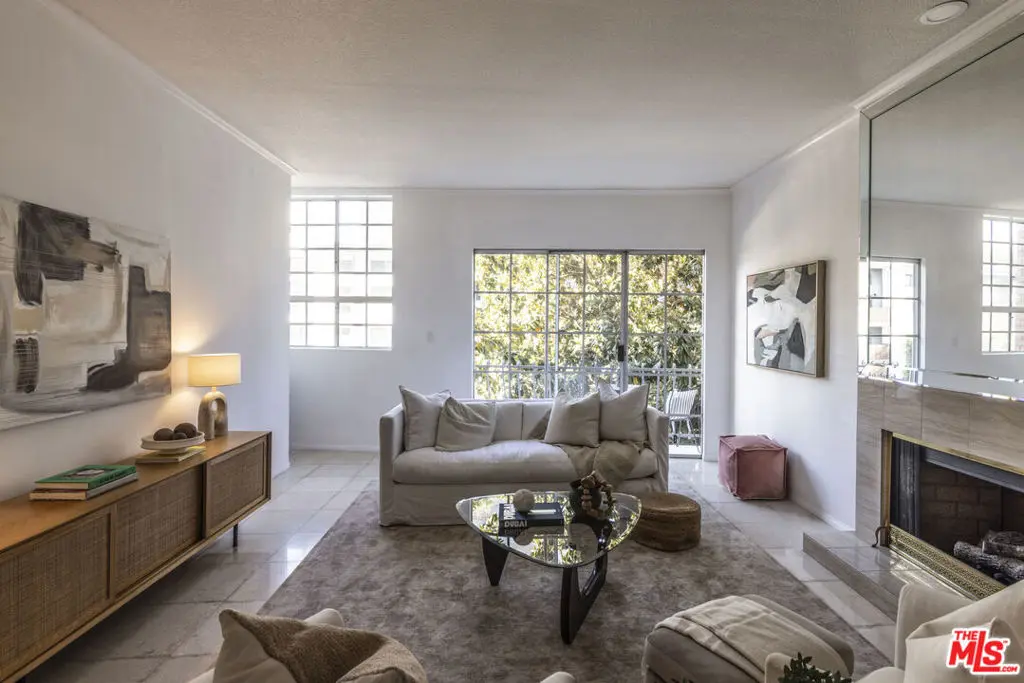 Condominium for sale at 10960 Wellworth Avenue 201, Los Angeles, CA featuring 2 beds and 2 baths