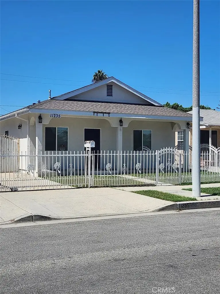 Single Family Residence for rent at 11235 ELM Street, Lynwood, CA featuring 4 beds and 2 baths