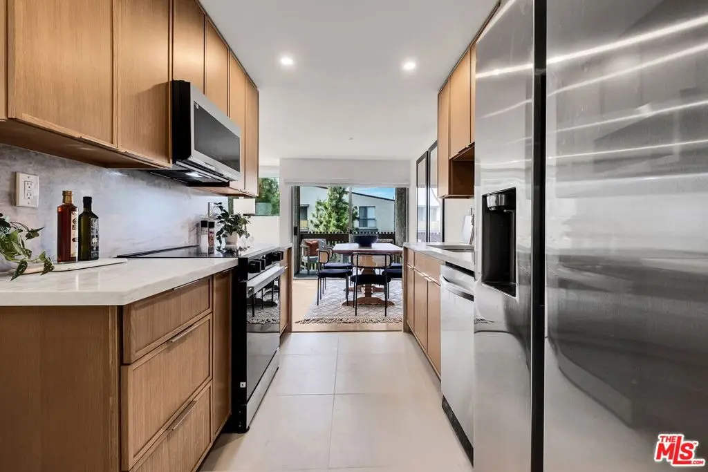 Condominium for sale at 6050 Canterbury Drive E313, Culver City, CA featuring 2 beds and 2 baths