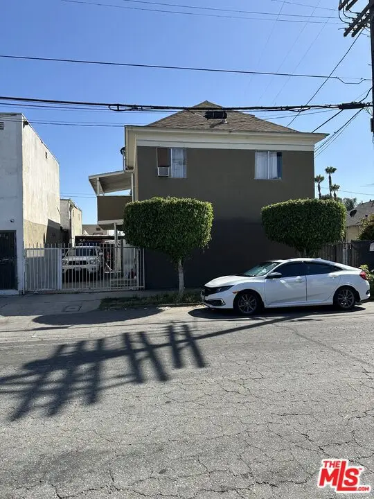 Residential Income for sale at 554 E 36th Street, Los Angeles, CA featuring 4 beds and 2 baths