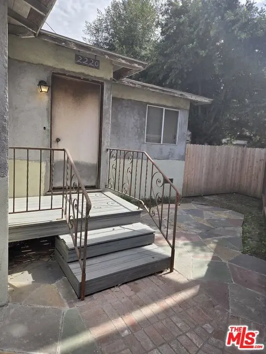 Single Family Residence for sale at 2220 S Bundy Drive, Los Angeles, CA featuring 2 beds and 2 baths