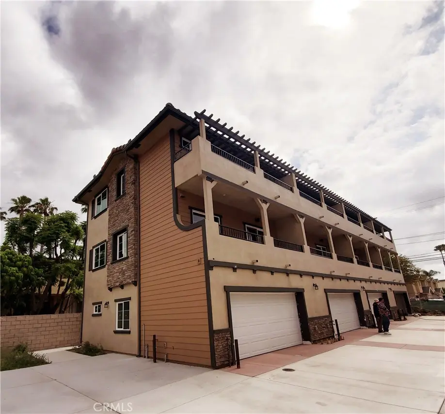 Townhouse for rent at 10341 Western Avenue 8, Downey, CA featuring 4 beds and 4 baths
