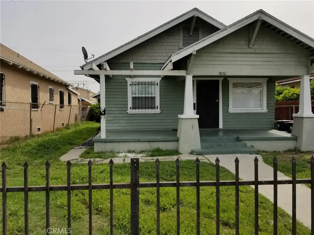 Duplex for sale at 5856 S Olive, Los Angeles, CA featuring 3 beds and 2 baths
