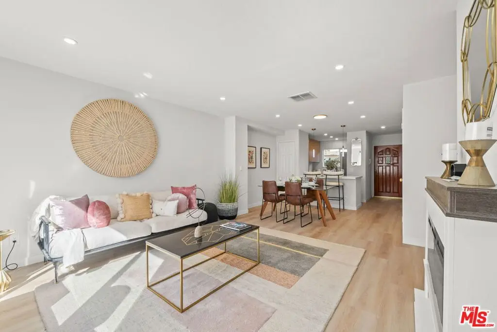 Condominium for sale at 8515 Saturn Street 103, Los Angeles, CA featuring 2 beds and 2 baths