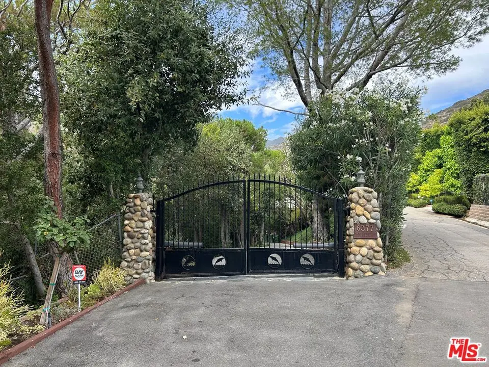Single Family Residence for sale at 6377 Via Escondido Drive, Malibu, Los Angeles County, CA featuring 4 beds and 6 baths