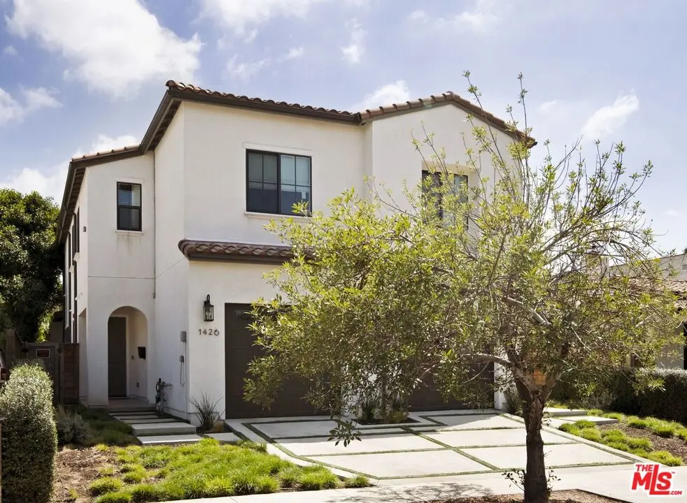 Townhouse for sale at 1426 S Sierra Bonita Avenue, Los Angeles, CA featuring 4 beds and 3 baths