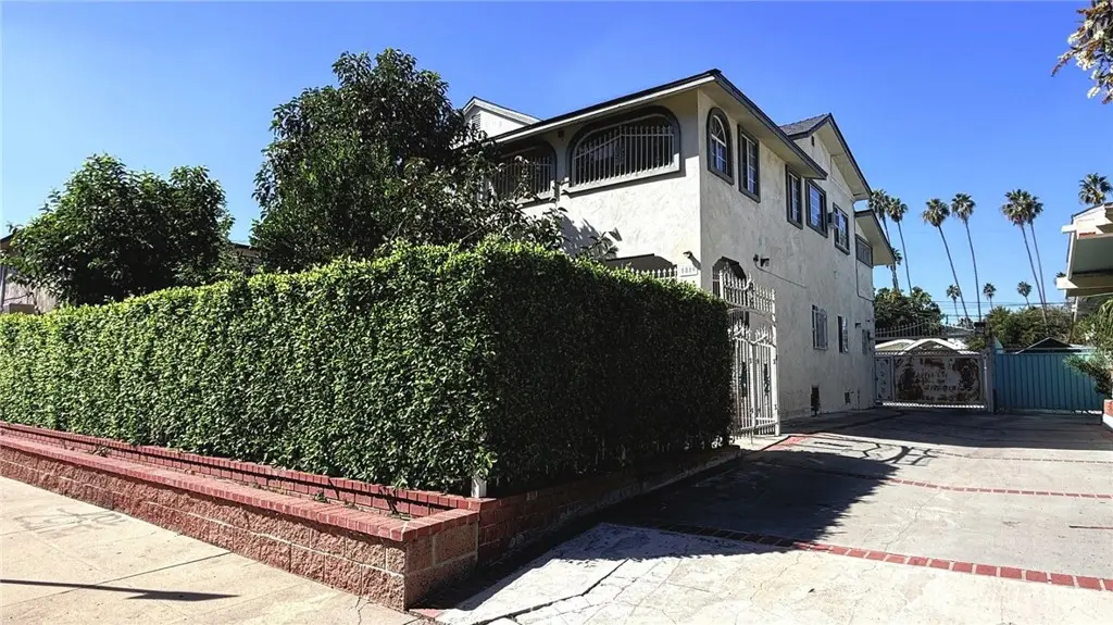 Single Family Residence for sale at 1819 S Norton Avenue, Los Angeles, CA featuring 7 beds and 4 baths
