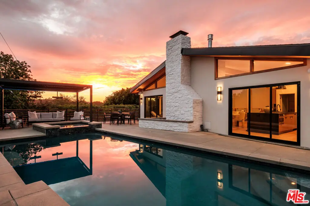 Single Family Residence for sale at 7995 Briar Summit Drive, Los Angeles, CA featuring 4 beds and 5 baths