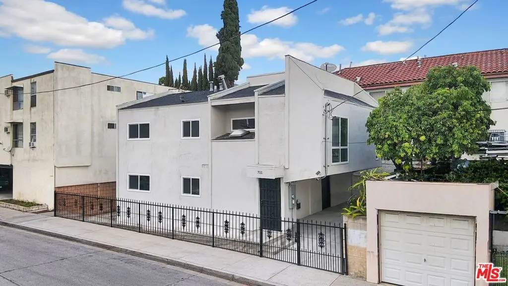 Single Family Residence for sale at 711 Bartlett Street, Los Angeles, CA featuring 5 beds and 2 baths