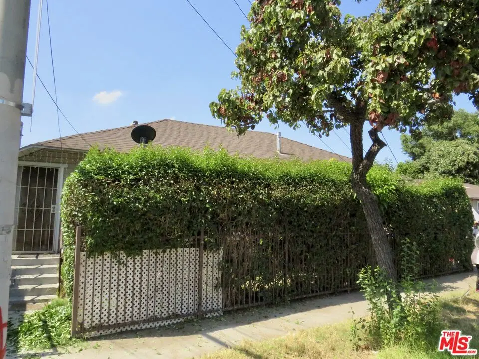 Residential Income for sale at 4002 Paloma Street, Los Angeles, CA featuring 4 beds and 2 baths