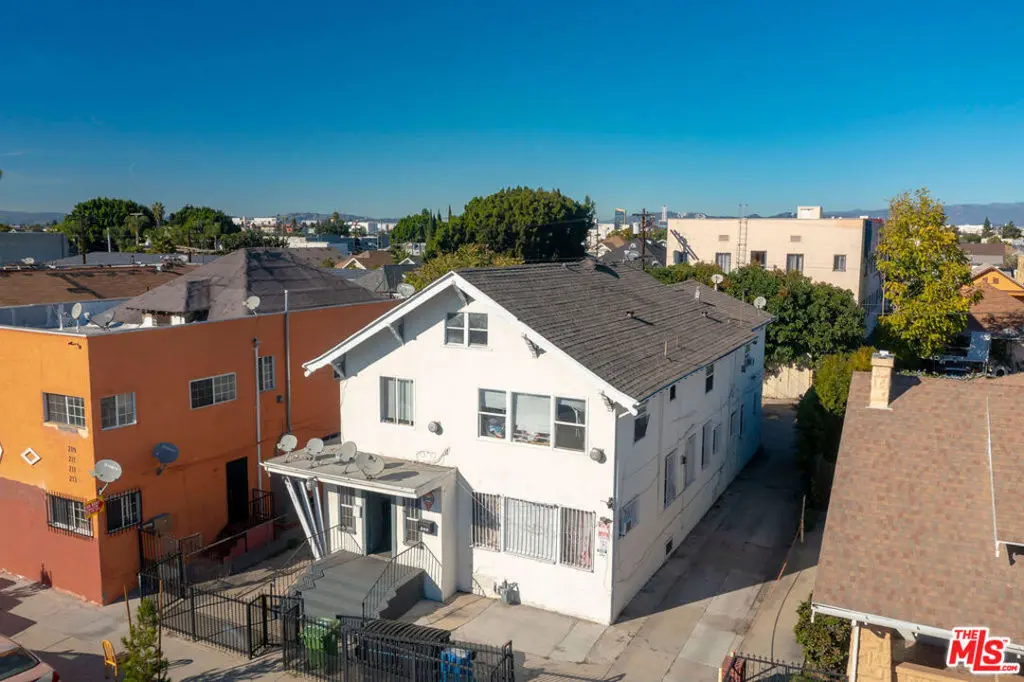 Residential Income for sale at 205 W Vernon Avenue, Los Angeles, CA featuring 5 beds and 7 baths