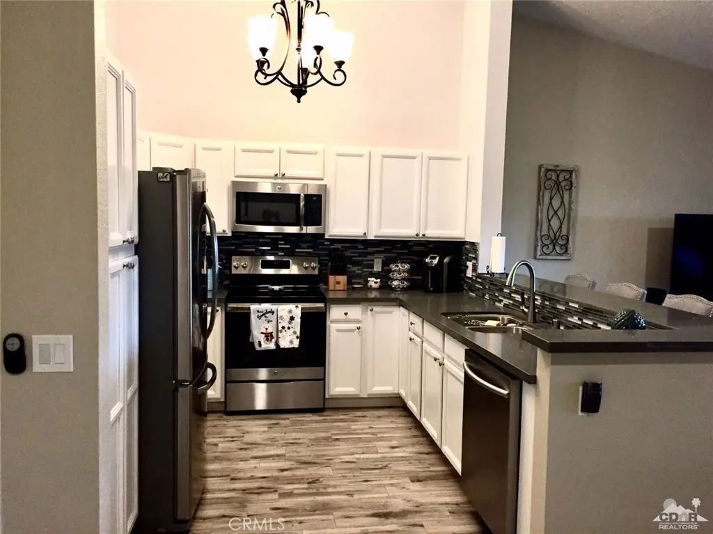 Residential Lease for rent at 41120 Woodhaven Drive, Palm Desert, Riverside County, CA featuring 2 beds and 2 baths