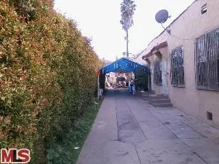 Residential Income for sale at 1424 MEADOWBROOK Avenue, Los Angeles, CA
