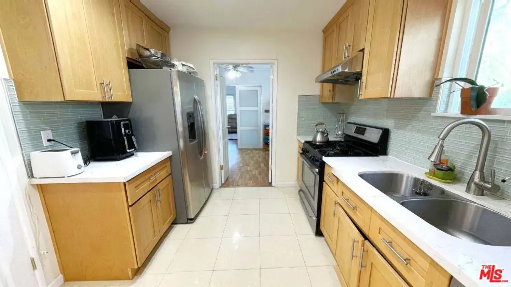 Single Family Residence for sale at 12844 Greene Avenue, Los Angeles, CA featuring 3 beds and 2 baths